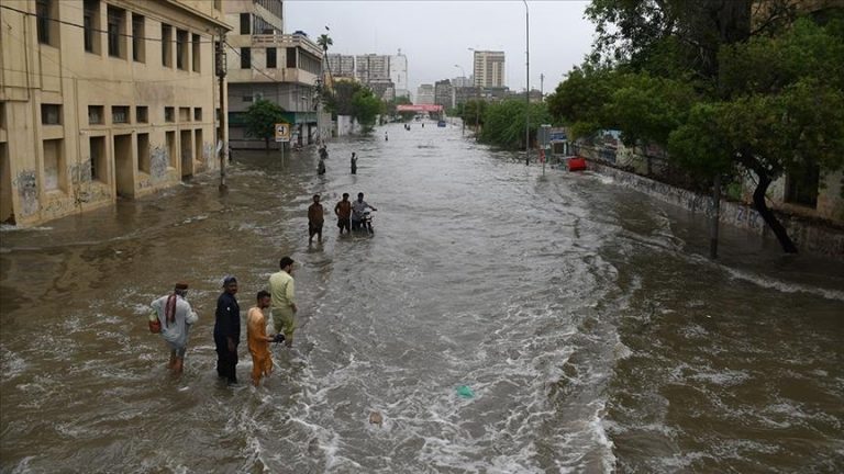Another 34 people are killed by raging floods in Pakistan.