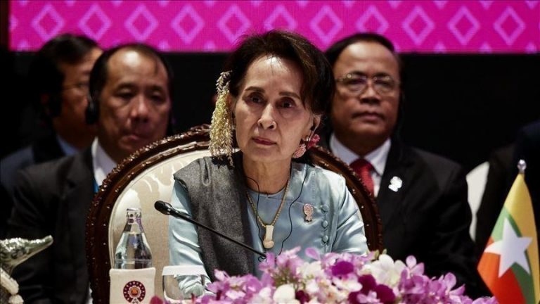 Suu Kyi is given a 3-year prison sentence by a military court in Myanmar for breaking a secret law.