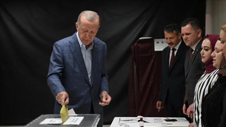Turkish President casts ballots in presidential and legislative elections.