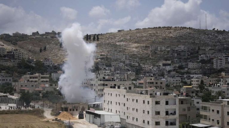 In an airstrike on a West Bank city, Israeli soldiers murder 3 Palestinians and injure 13 others.