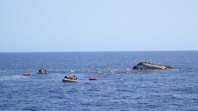 Two migrants are murdered and 31 are missing after their boats capsize off the coast of Italy.