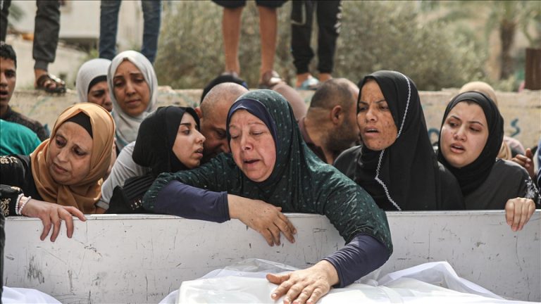 The number of Palestinians killed in Israeli attacks on Gaza has risen to 1,900, including 614 children.
