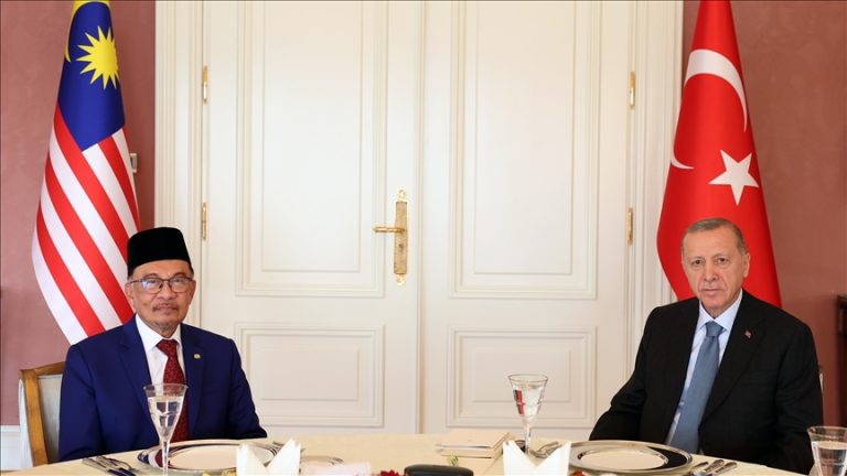 Turkish President Erdogan visits Malaysian Prime Minister Najib Razak for talks.