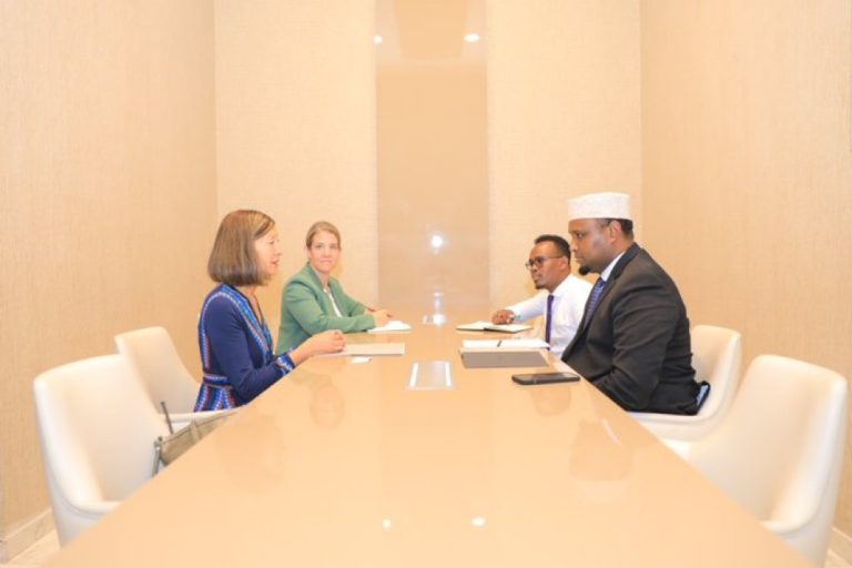 In Somalia, the Minister of Planning meets with the Director of the USAID Mission.