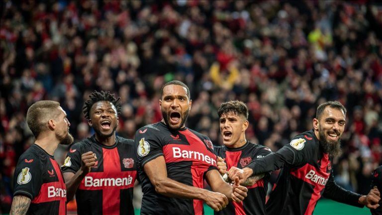 Bayer Leverkusen keeps their Bundesliga title hopes alive with a 3-0 win over Bayern Munich.