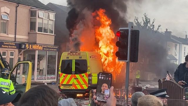 Southport Stabbing Tragedy: Rioters attacking police and raiding shops.