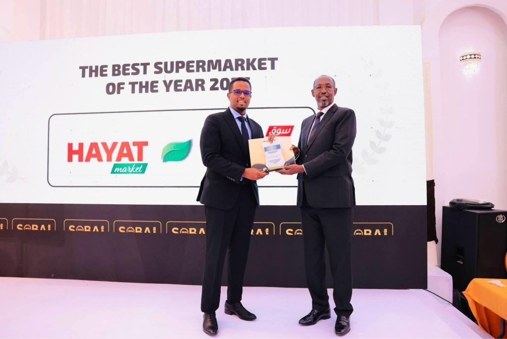Hayat Market receives the Best Supermarket of the Year 2026 award on stage at the Somali Business Awards gala in Mogadishu. Photo: Supplied